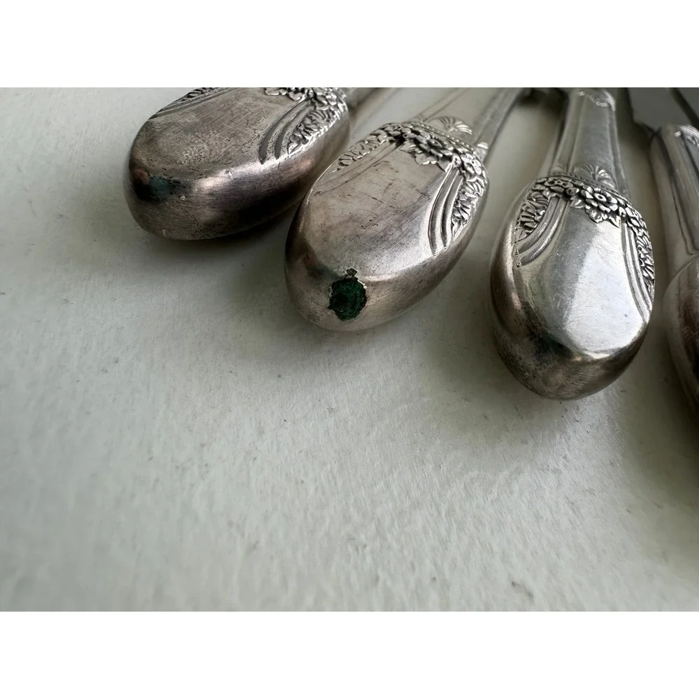 1937 Roger's Co. set of 8 First Love pattern stainless butter knives